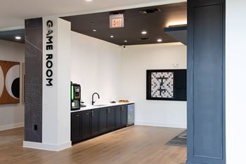 A room with a sign that says Game Room at The Crest at South Point Apartments, Davenport , Georgia